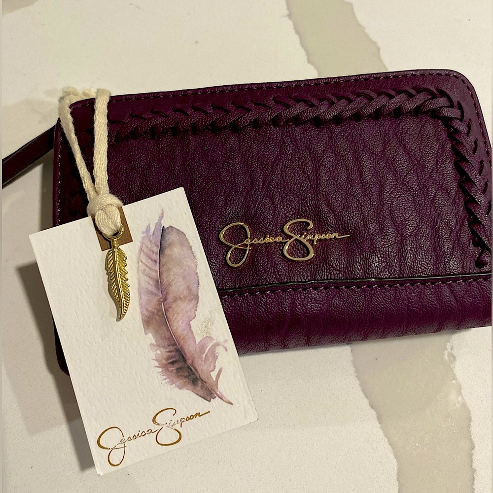 Purple faux leather Jessica Simpson wallet with cheetah print interior